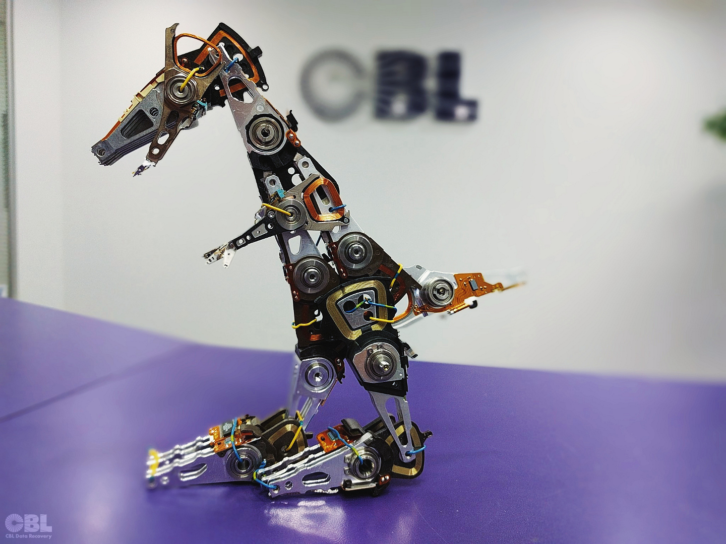 'HDD-Rex: King of the Hard Drives' - dinosaur sculpture made from hard drive parts