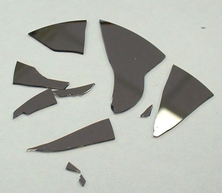 Pieces of You 2 - shattered hard drive platter pieces