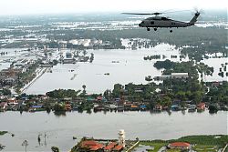 Helicopter surveying flood devastated suburban Bangkok