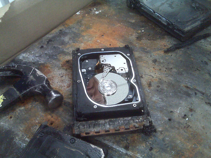 fire burnt hard disk drive from a server revealing potentially recoverable data platters
